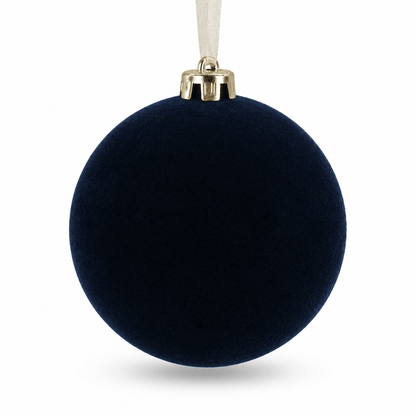 Close-up of blue velvet Christmas bauble showcasing its soft navy velvet texture, metallic gold hanging cap and delicate sheer ribbon loop.