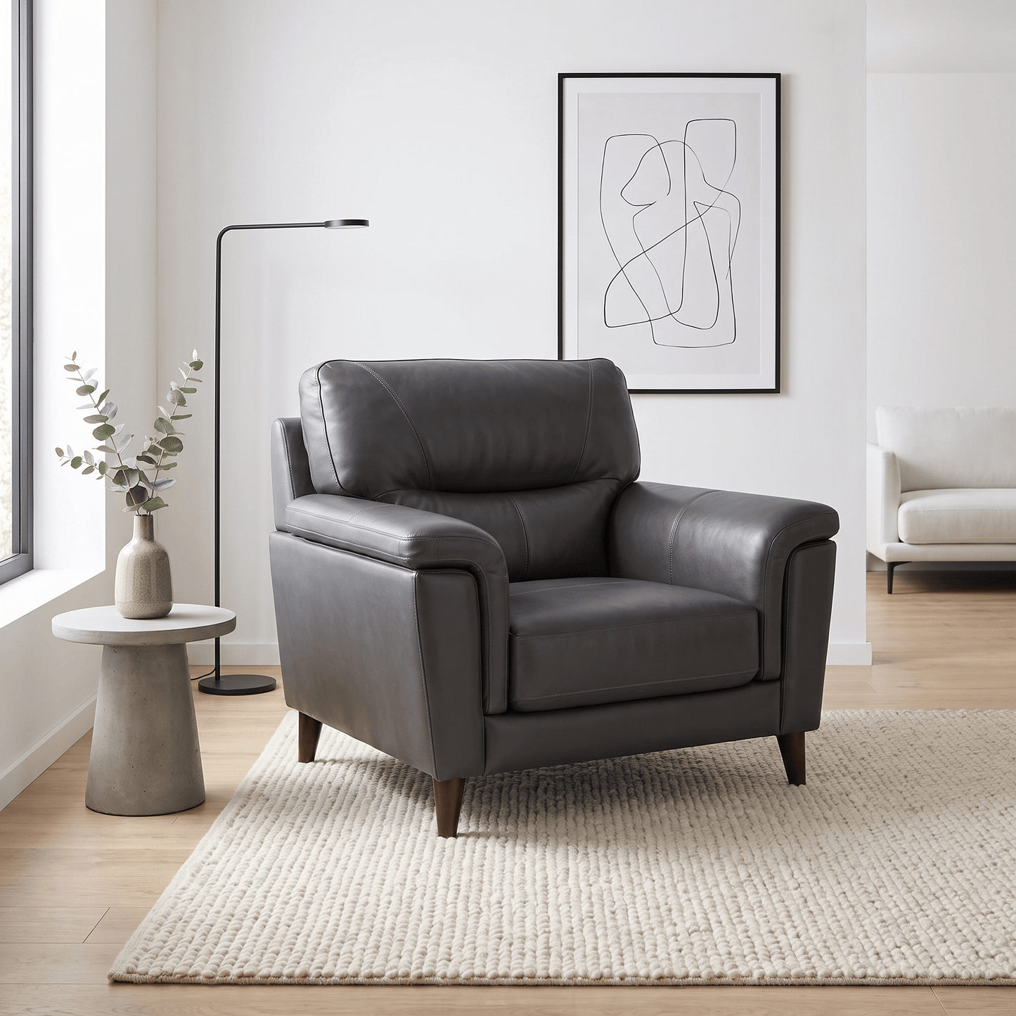 Compton Armchair styled in modern living room, dark grey leather-look armchair, contemporary accent chair