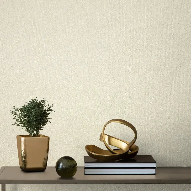 Gianni Plain Natural Textured Wallpaper styled with modern gold decor and neutral interior