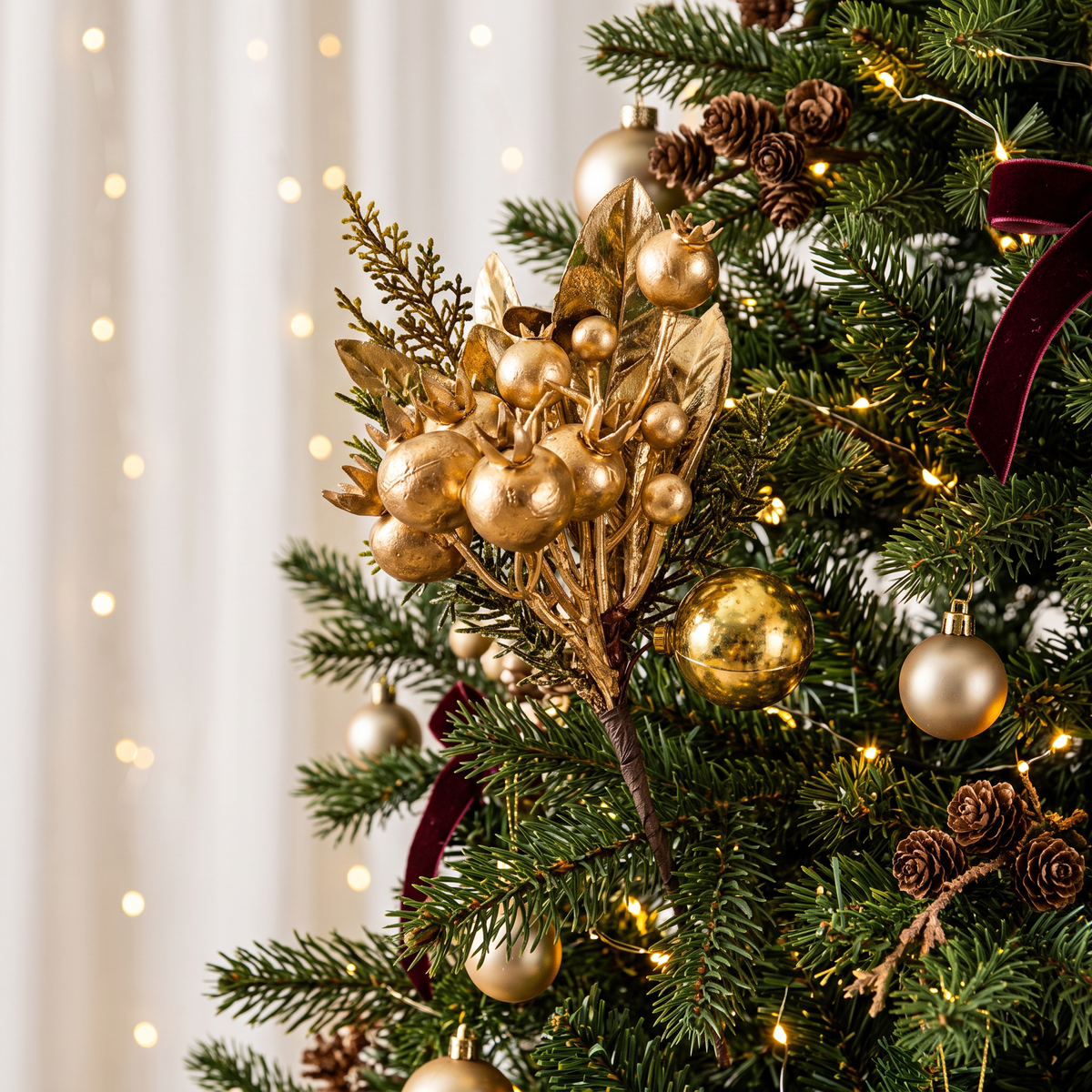 Gold Floral Pick 29cm styled in Christmas tree with gold festive decorations and greenery