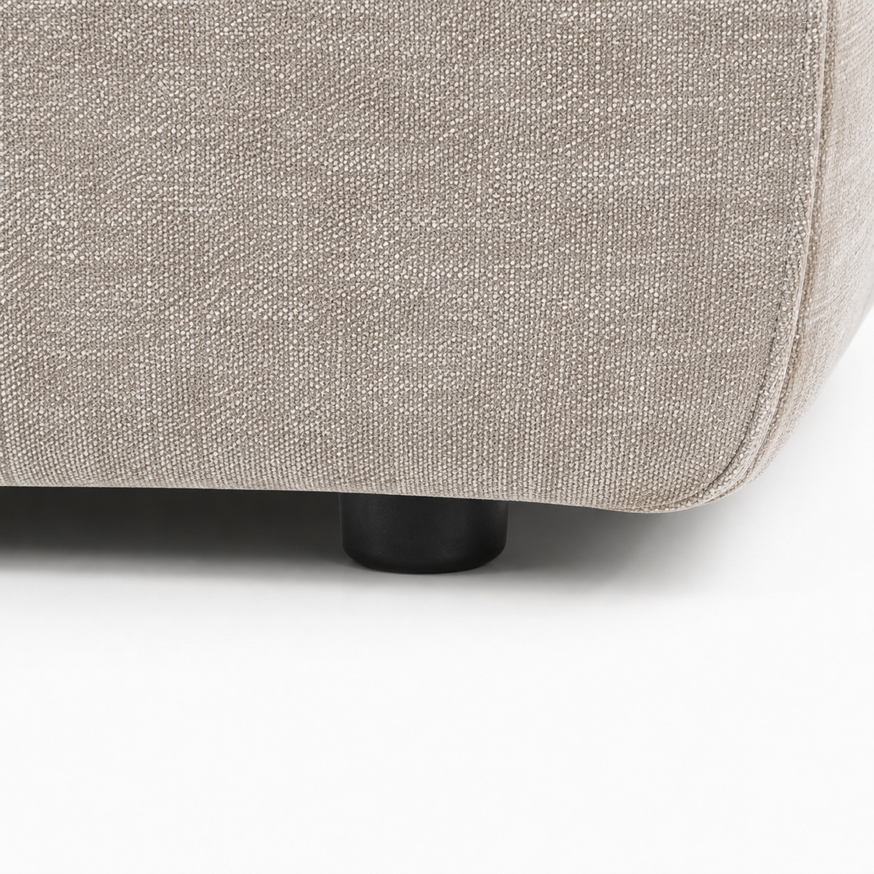 Maine 2 Seater Sofa Latte foot close-up – upholstered sofa base with dark furniture leg