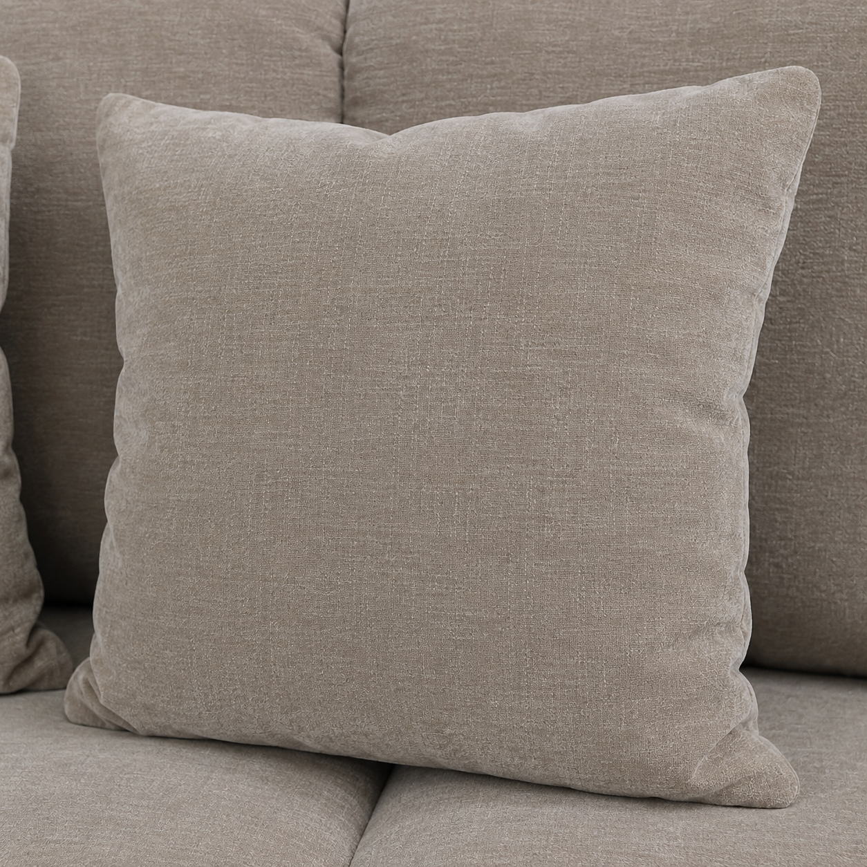 Maine 2 Seater Sofa Latte scatter cushion close-up – textured neutral fabric sofa cushion