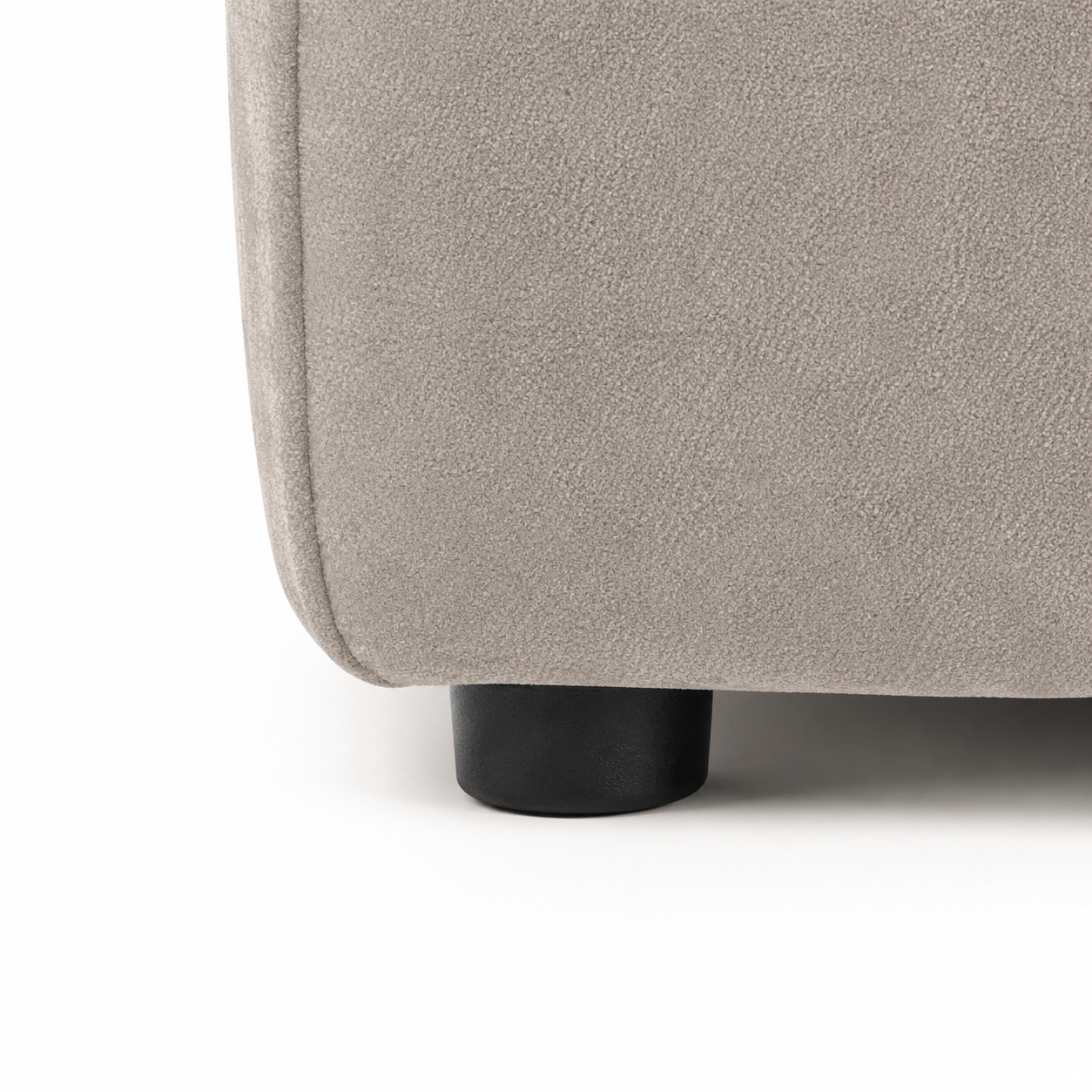 Maine Right Hand Facing Corner Sofa Latte foot close-up – black sofa leg and textured upholstery