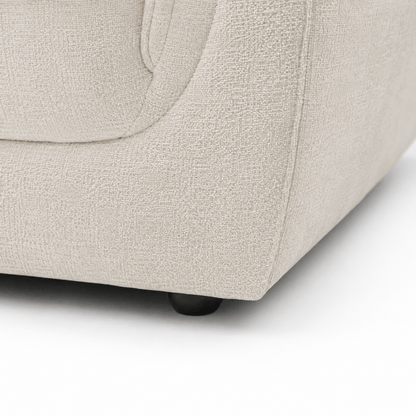 Margot LHF Chaise Sofa - White close up of black sofa foot and fabric texture