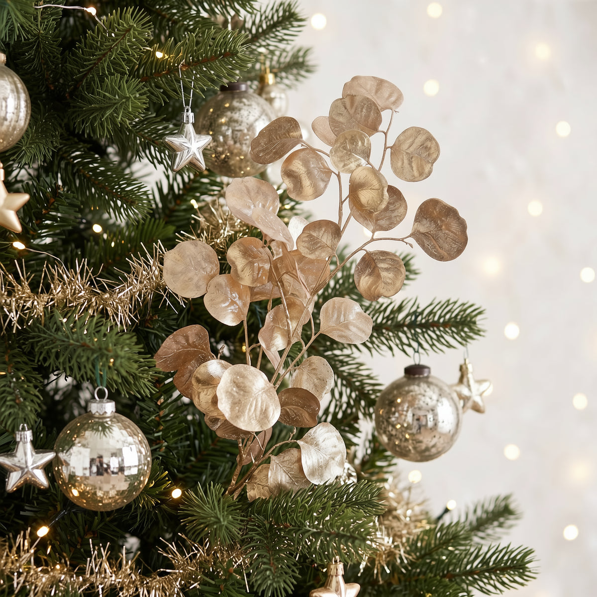 Metallic Eucalyptus Spray 76cm festive Christmas foliage styled in Christmas tree