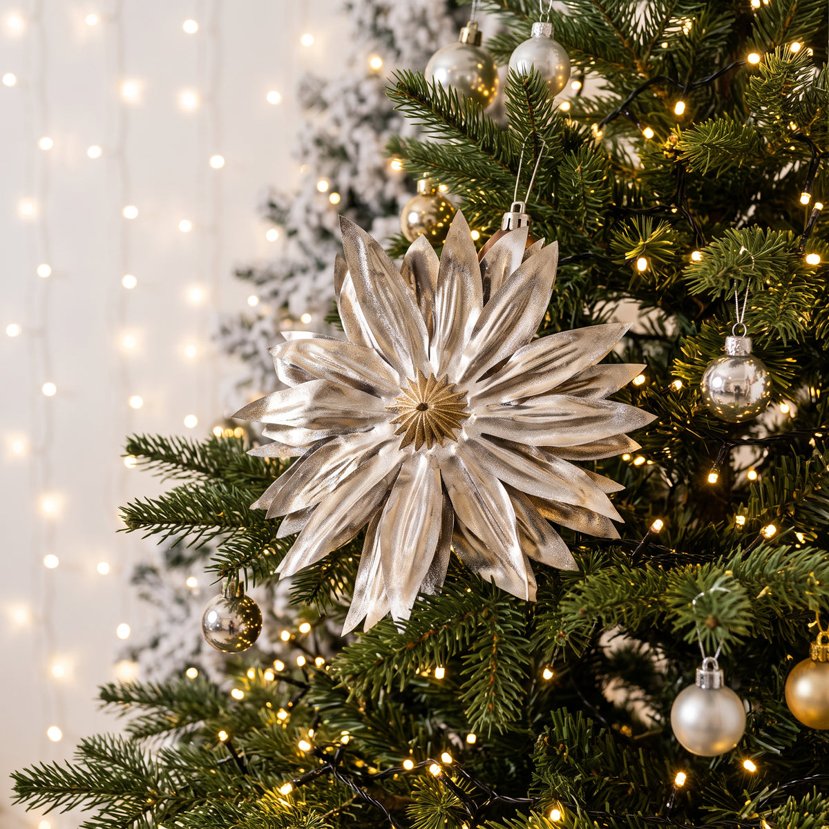 Metallic Pewter Dahlia Clip-On Decoration 17cm displayed on Christmas tree with warm white lights