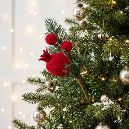 Red Pick 22cm styled in Christmas tree with flocked pomegranate berries and evergreen foliage