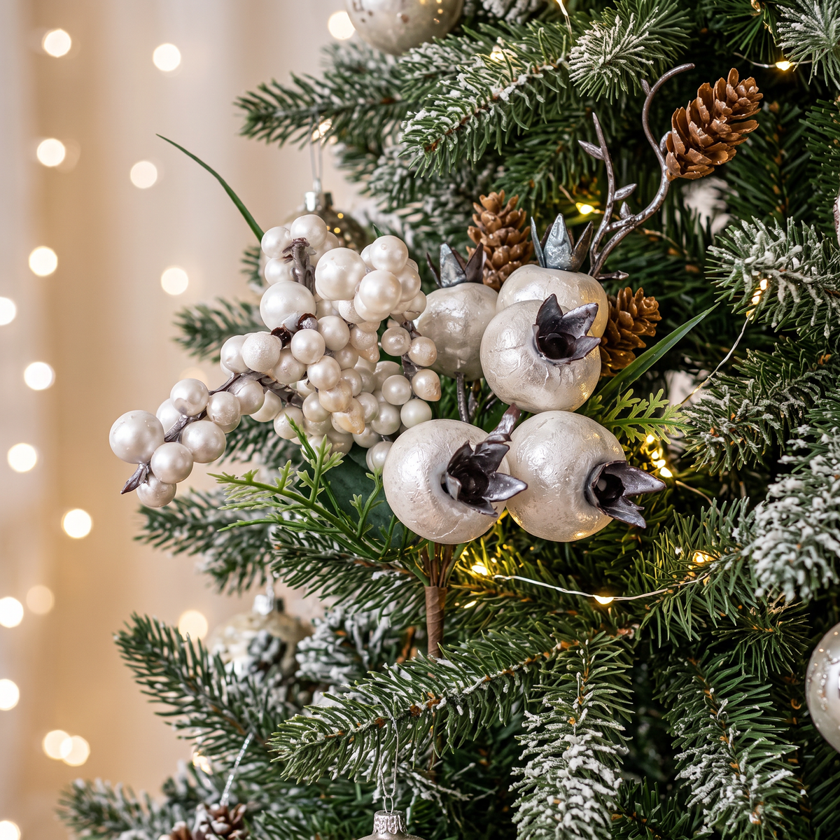 White Floral Pick 24cm styled in Christmas tree with pearl berries frosted fruit and pinecones