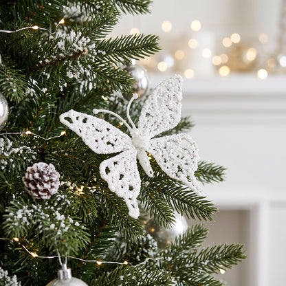 White Glitter Butterfly Clip 18cm displayed on festive Christmas tree